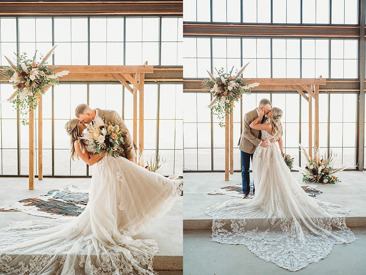 newlywed bride and groom kiss at boho venue shot by palo duro canyon elopement photographer