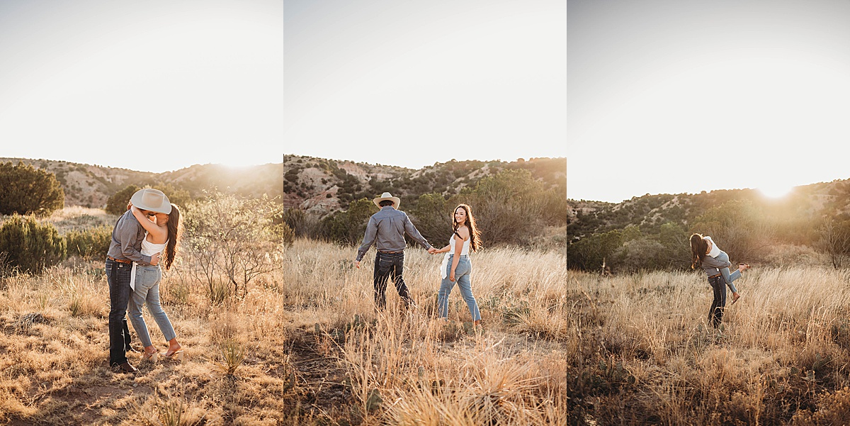 romantic couple walks through golden field during engagement shoot by Three Feather Photo Co