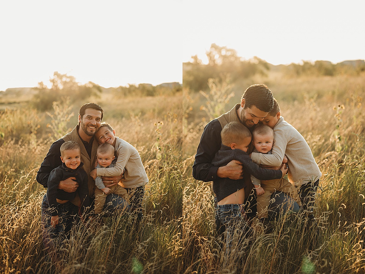 Dad hugs his three sons during family portraits by three feather photo co.