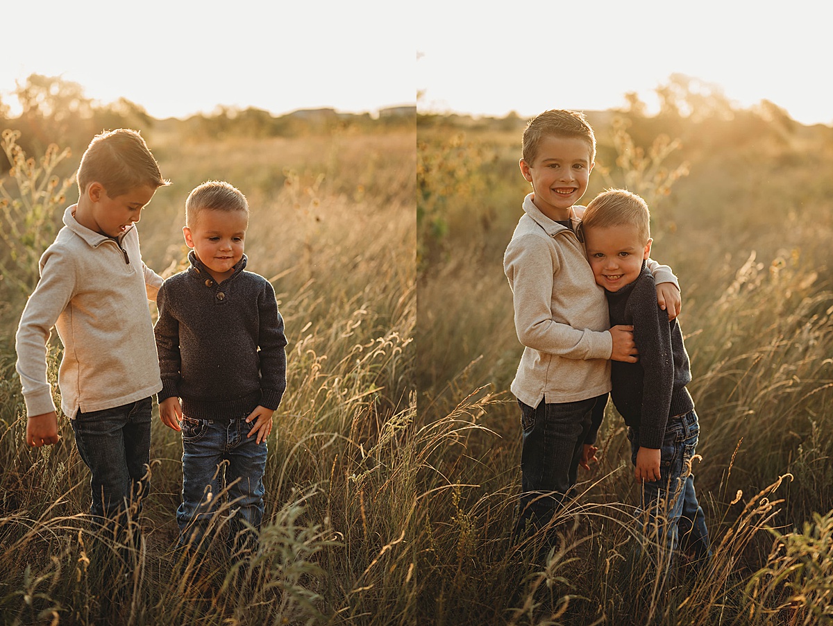 two brothers pose for portraits during outdoor family shoot by three feather photo co.