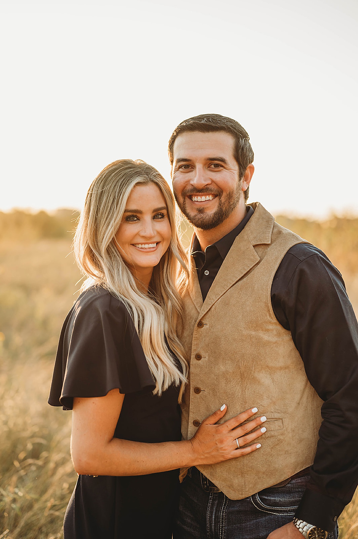 man and woman pose for couple photos during shoot by palo duro canyon elopement photographer