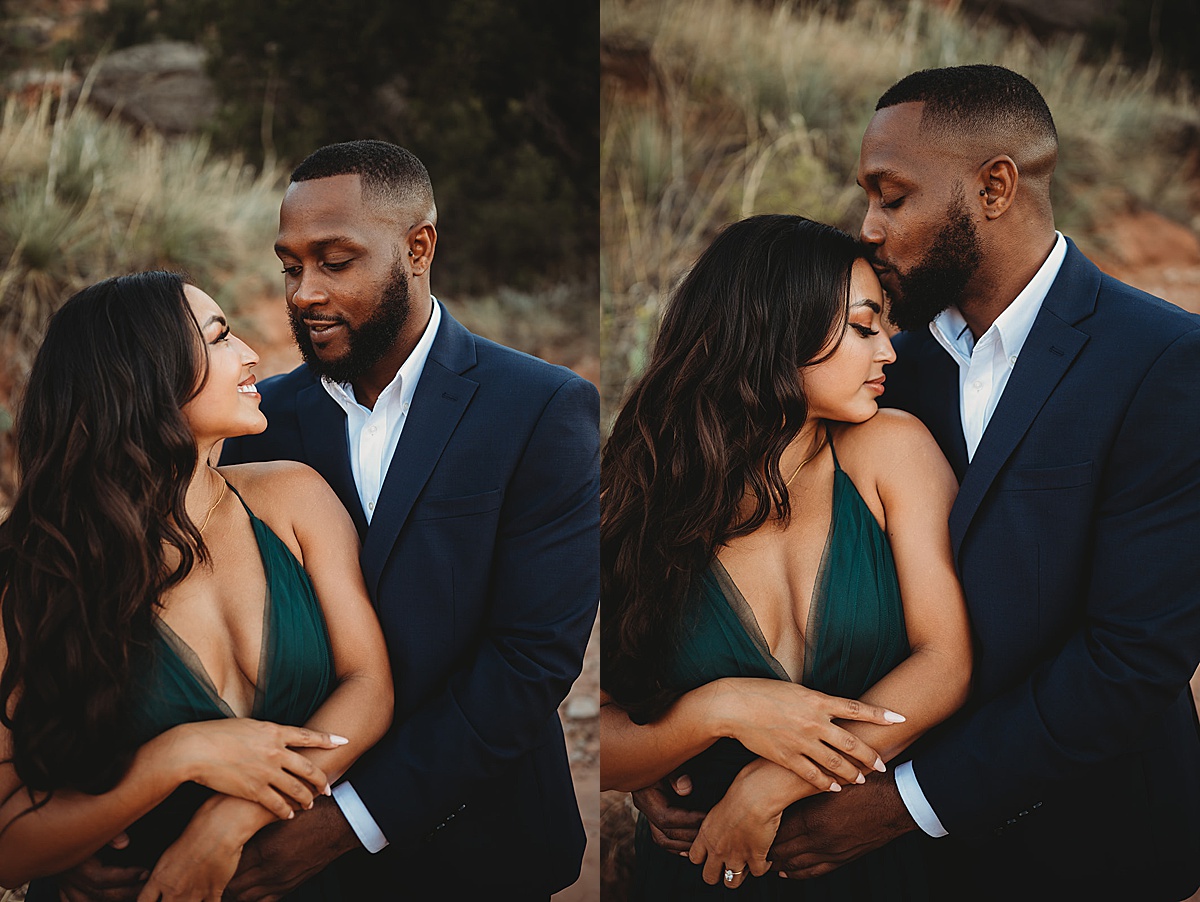 couple in elegant evening wear pose in rugged canyon for glamorous nature engagement shoot