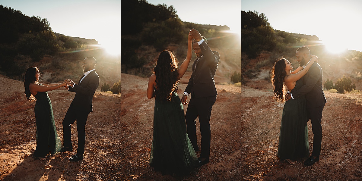 couple in evening attire dance in canyon during glamorous nature engagement shoot