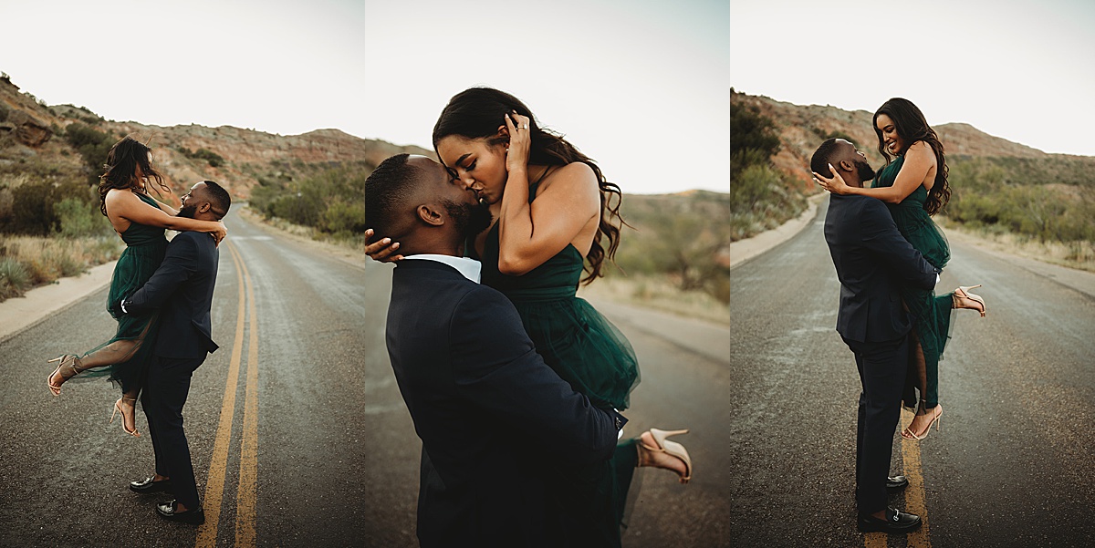 man sweeps his fiancee off her feet during romantic outdoor engagement shoot by Three Feather Photo Co.