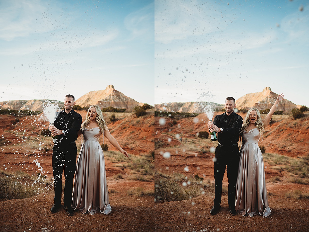 couple pops a bottle of champagne wearing evening attire in texas canyon during shoot by Three Feather Photo Co.