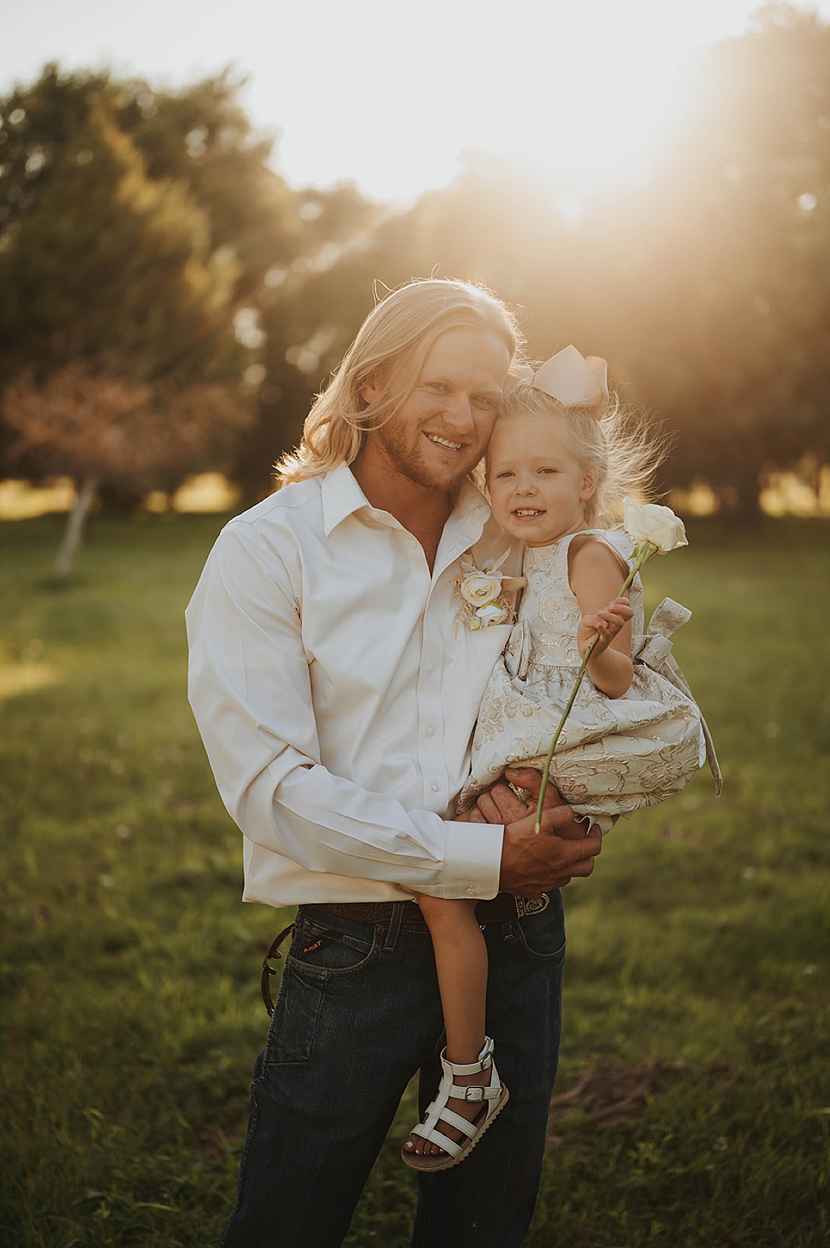 dad poses with young daughter after sweet elopement ceremony shot by Three Feather Photo Co