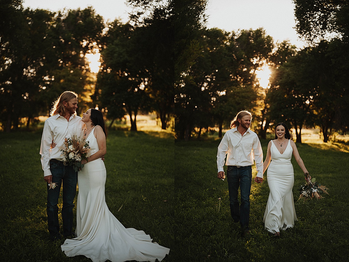 bride and groom walk through twilight field after minimalist boho wedding shot by Three Feather Photo Co
