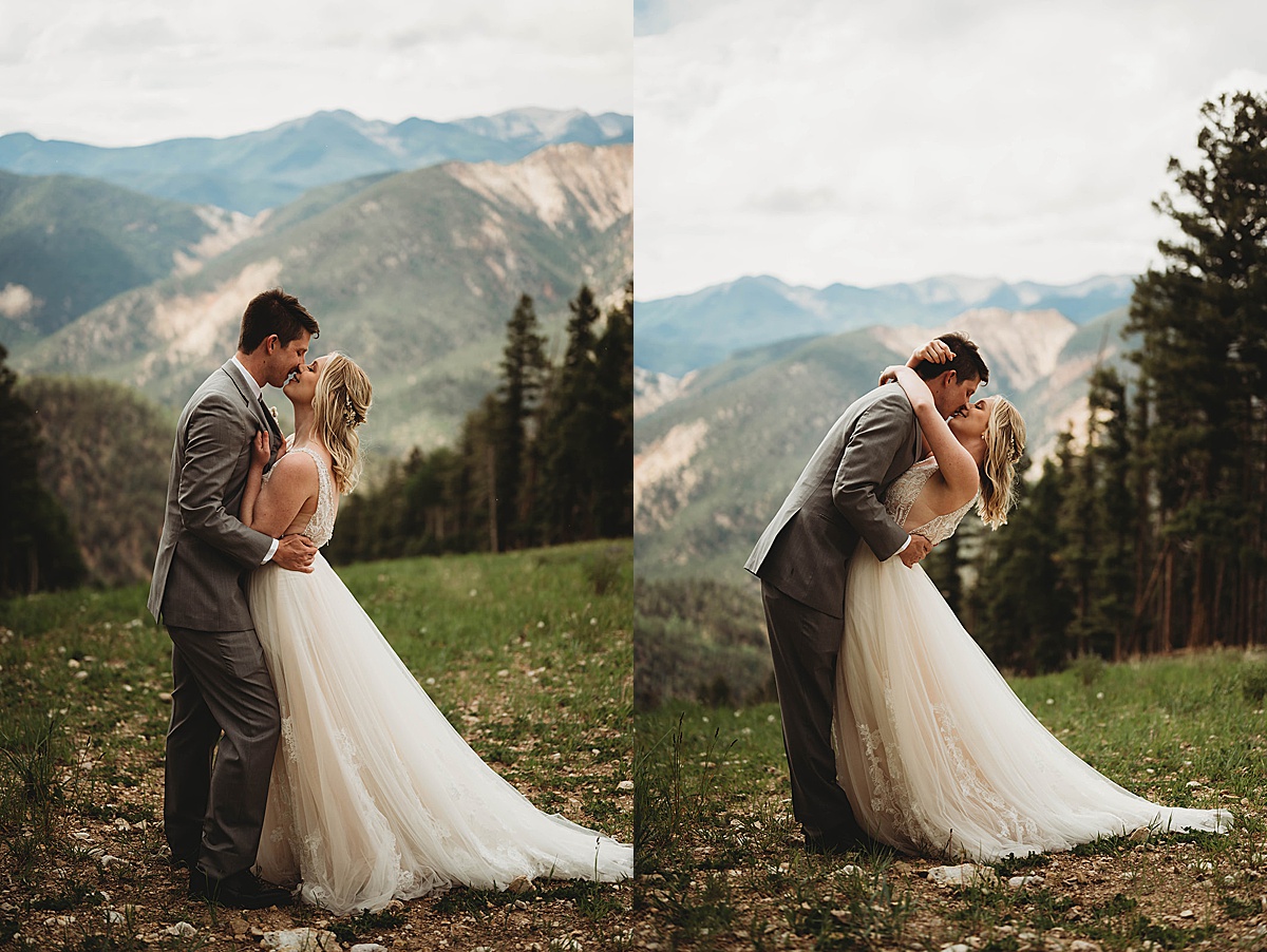 bride and groom kiss during Boho mountain top wedding at red river