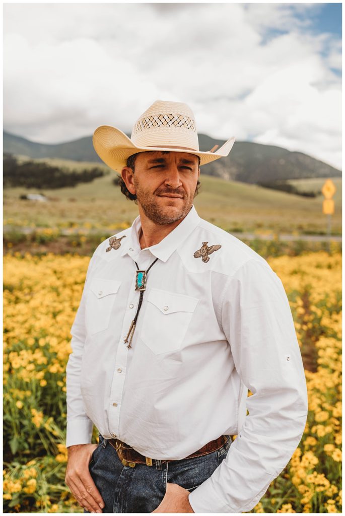 guy wearing cowboy hat and turquoise tie by Palo Duro Wedding Photographer