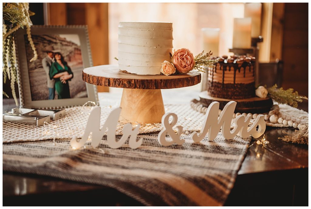 wedding cake and sign by Three Feather Photo
