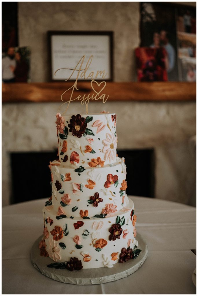 wedding cake with floral decorations by Palo Duro wedding photographer