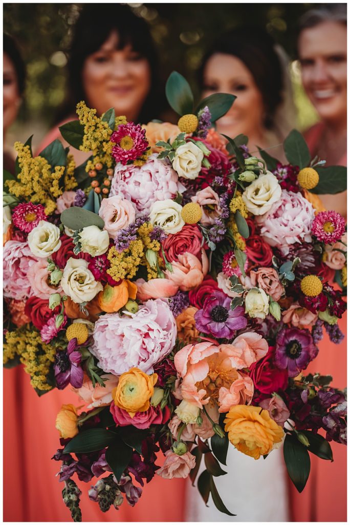 bright bouquets of flowers by Palo Duro wedding photographer