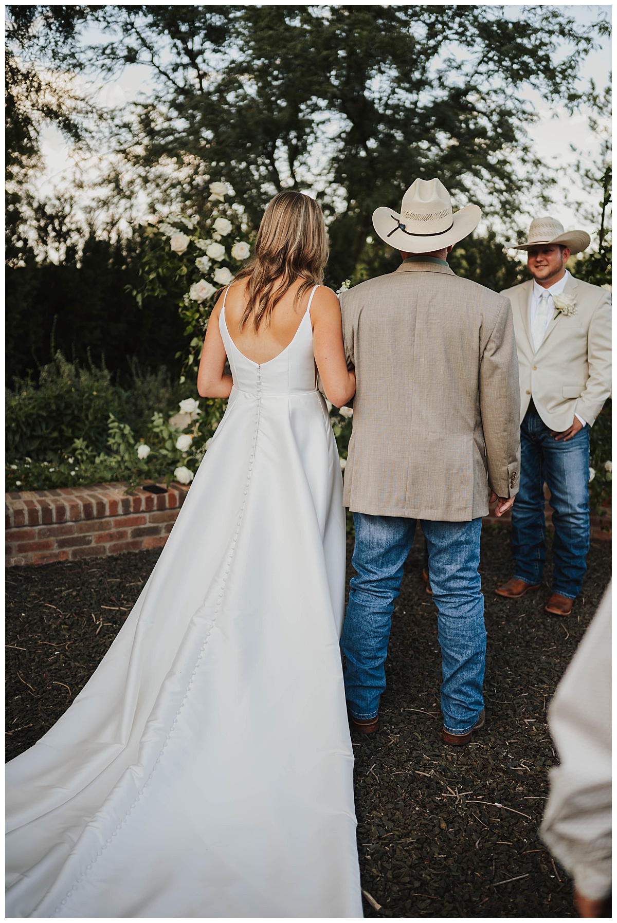 Dad walks daughter to altar by Three Feather Photo 