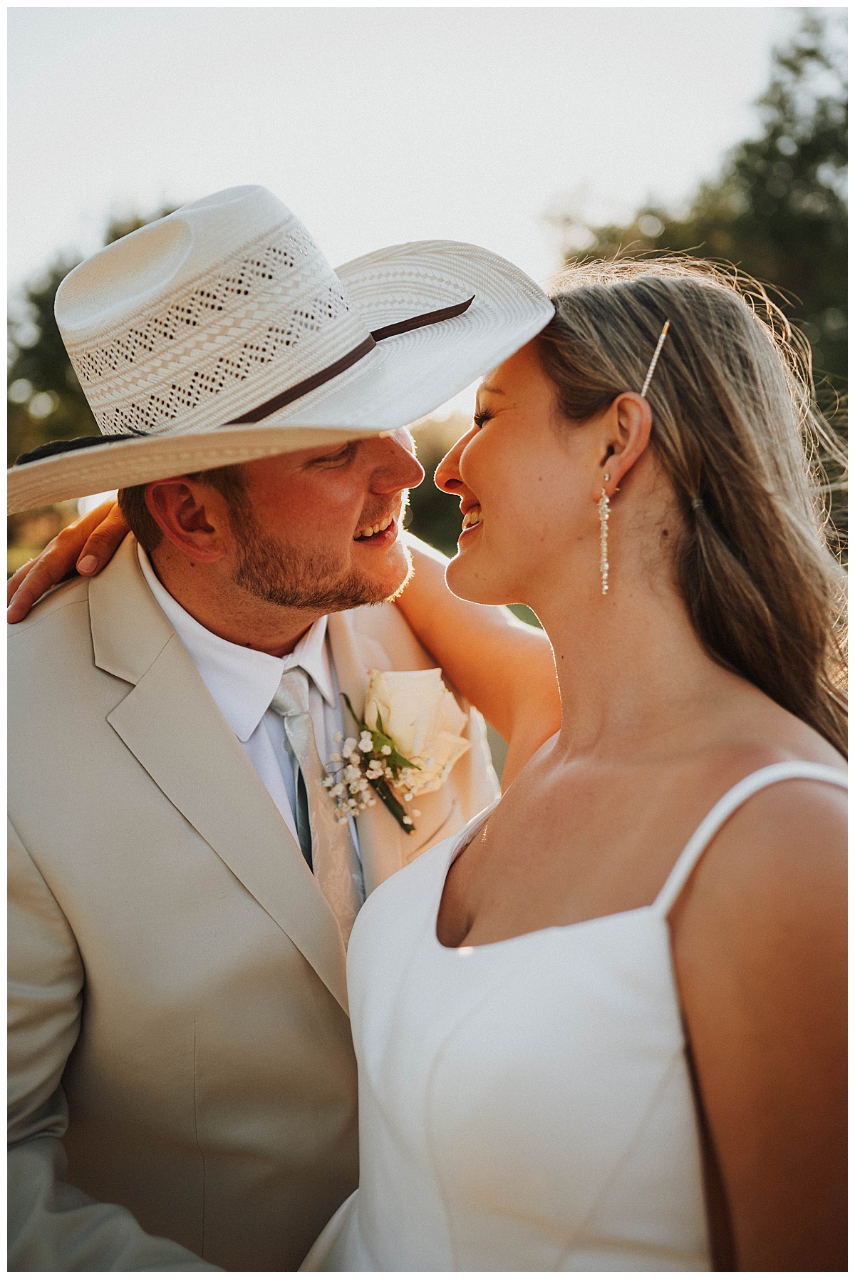 Newlyweds lean together by Amarillo portrait photographer